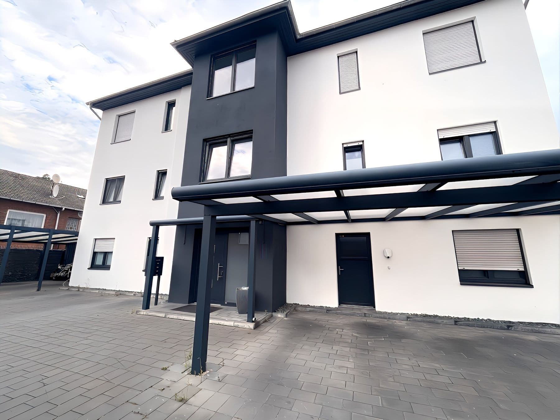 Moderne Erdgeschosswohnung mit traumhaftem Garten & Stellplatz in Godshorn, Außenansicht